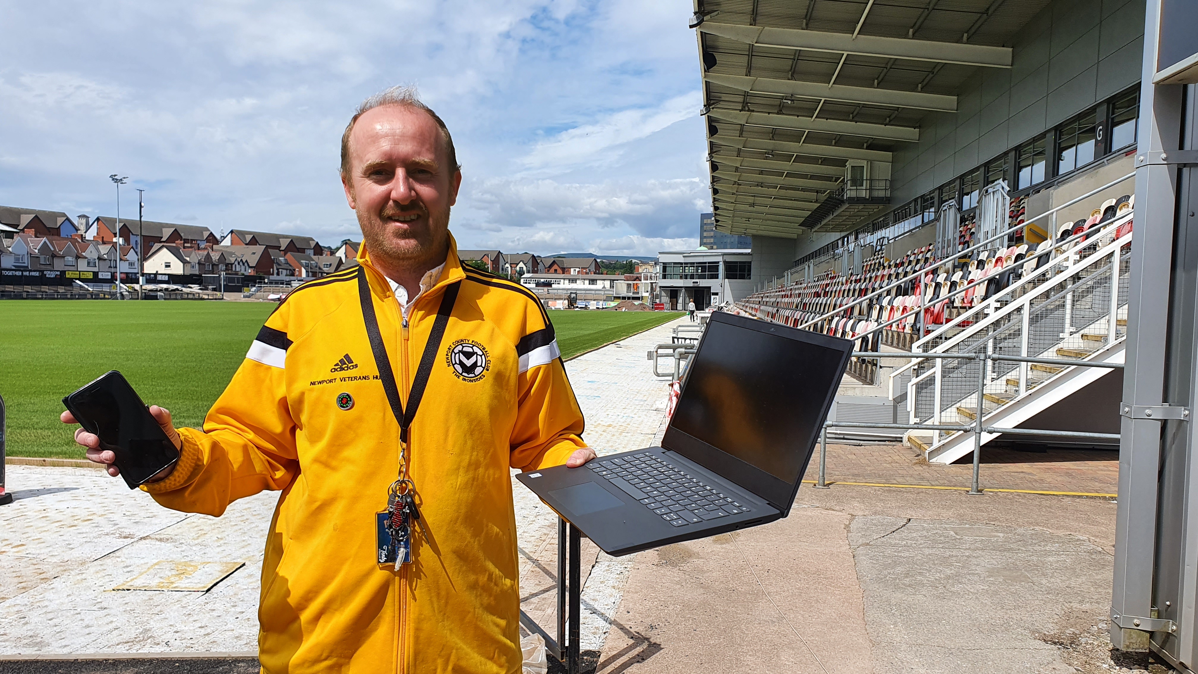 David Watkins, CEO of Newport Veterans Hub, with the mobile phone and laptop