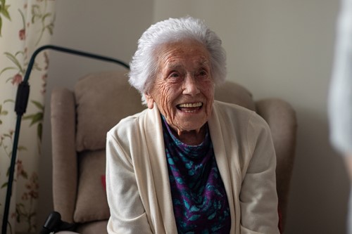 A older woman laughing