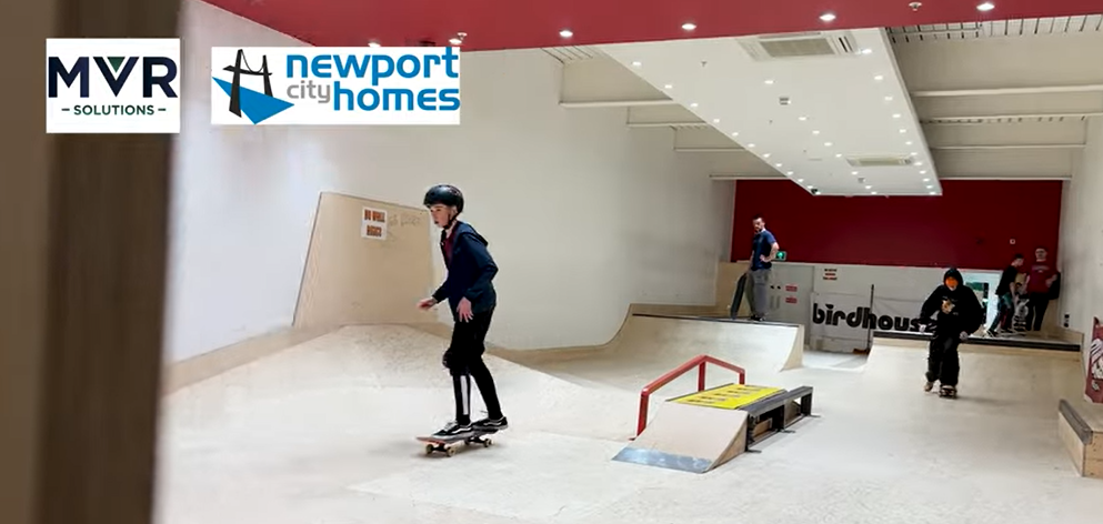 a boy skateboarding on a ramp